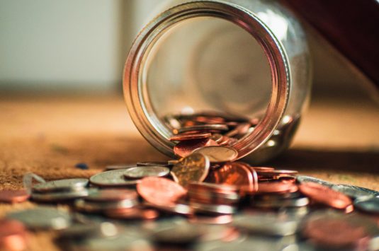 A spilled jar of coins
