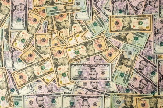 American currency representing tax filing obligations on dual US citizens who live outside the US